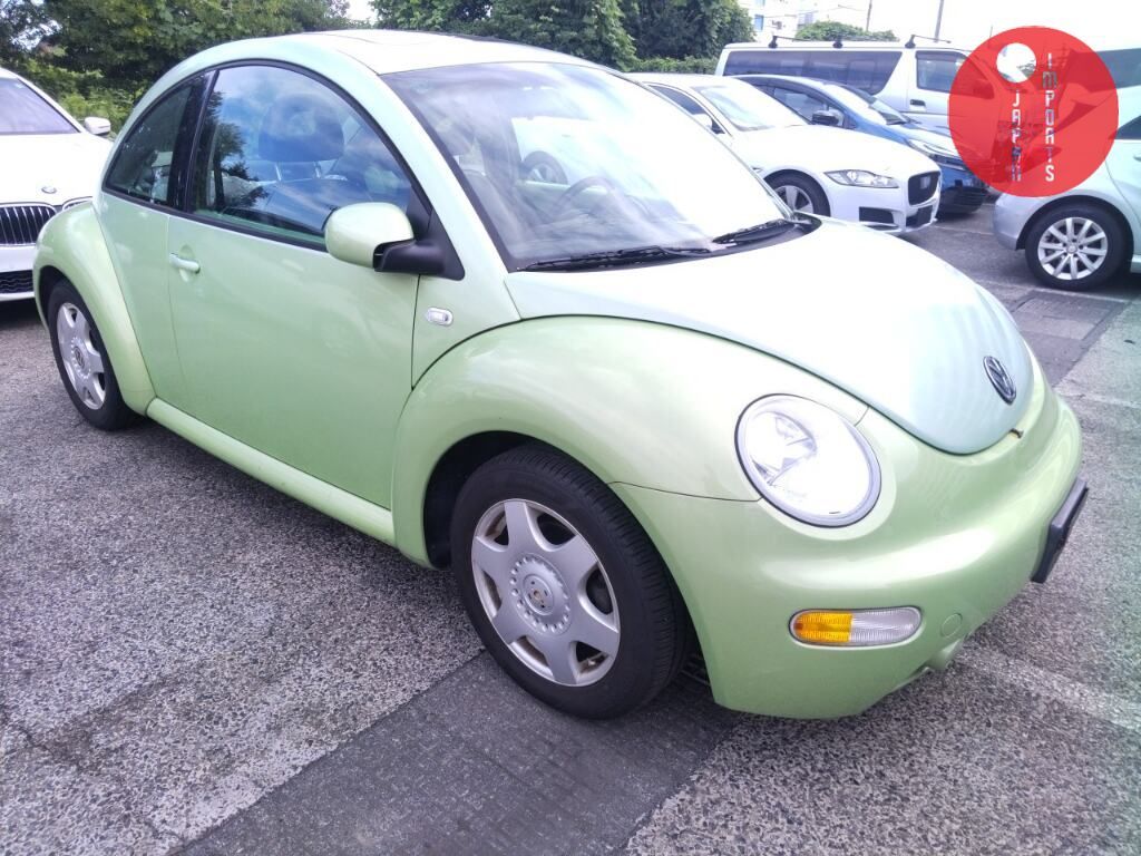VOLKSWAGEN                                                                      NEW BEETLE